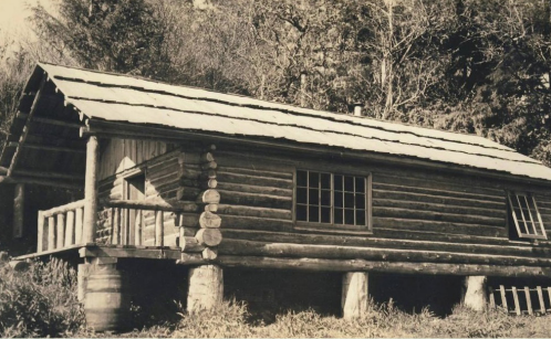 The small log cabin Scott built on his property on which Outer Shores Lodge sits today